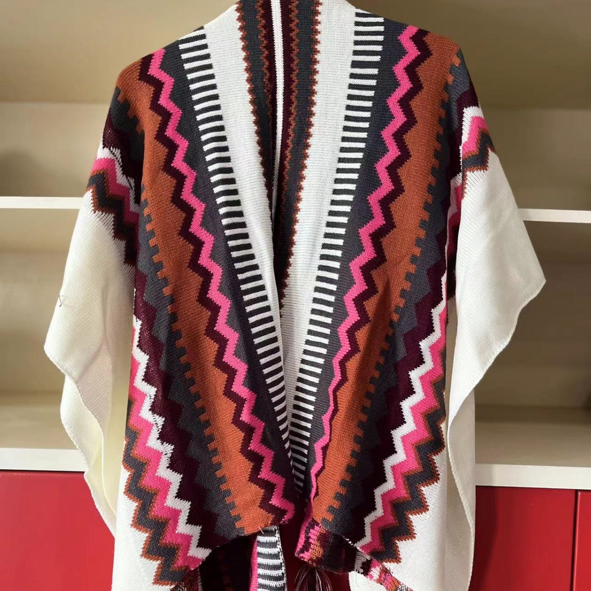 Bohemian Tassel Knit Cape – Free-Spirited & Stylish