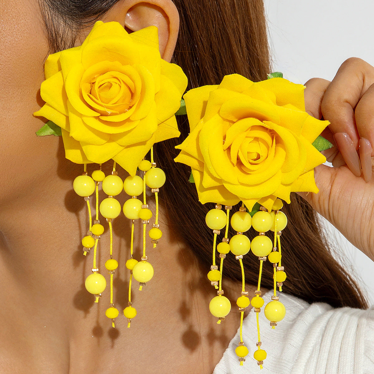Boho Blooms: Oversized Faux Flower Tassel Earrings