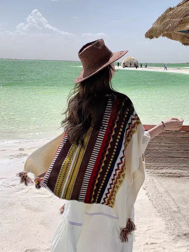 Bohemian Tassel Knit Cape – Free-Spirited & Stylish