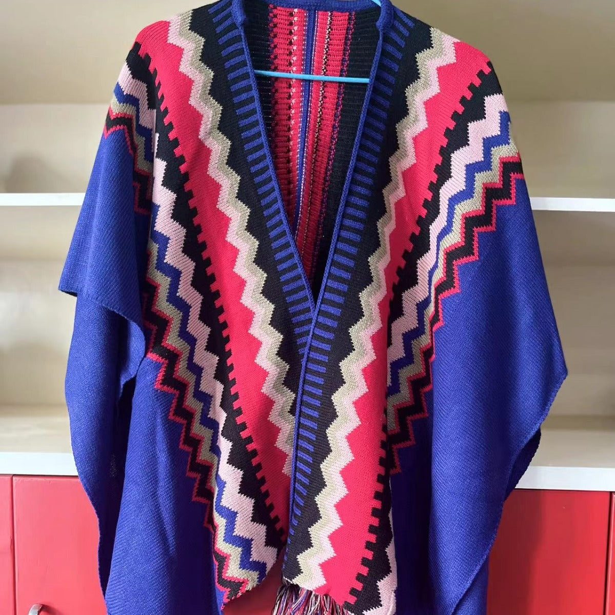 Bohemian Tassel Knit Cape – Free-Spirited & Stylish