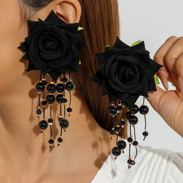 Boho Blooms: Oversized Faux Flower Tassel Earrings