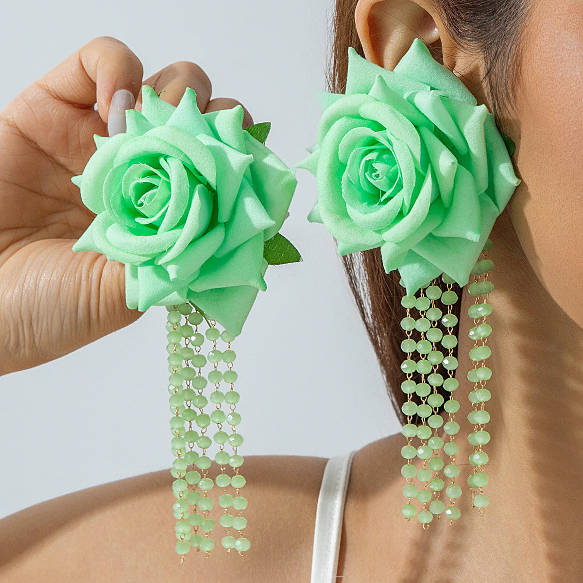 Boho Blooms: Oversized Faux Flower Tassel Earrings