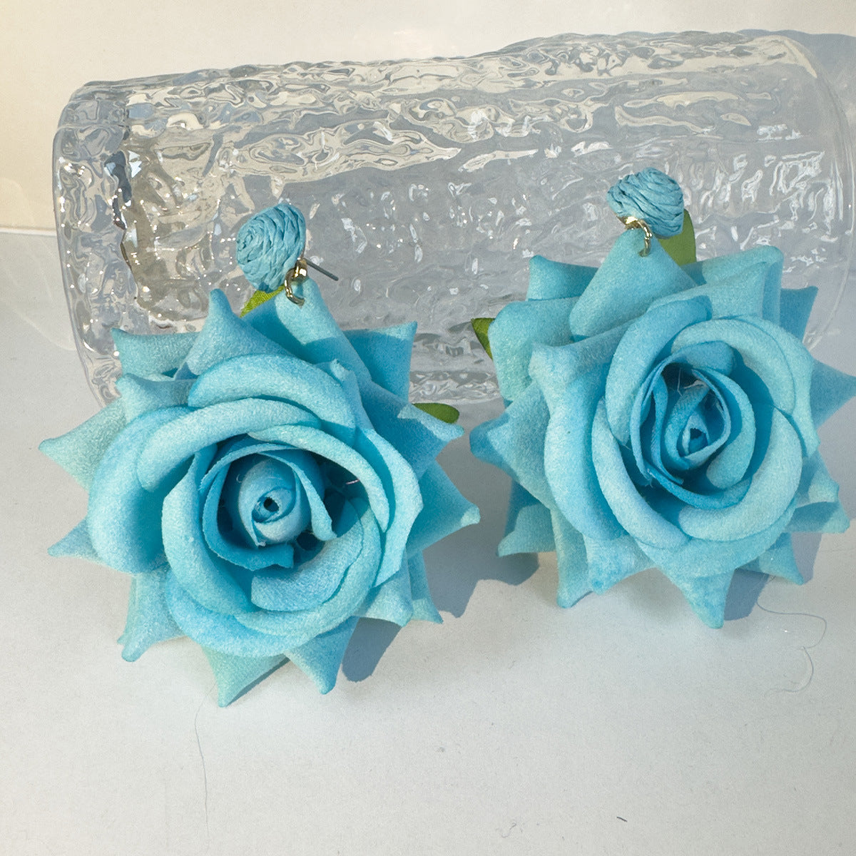 Boho Blooms: Oversized Faux Flower Tassel Earrings