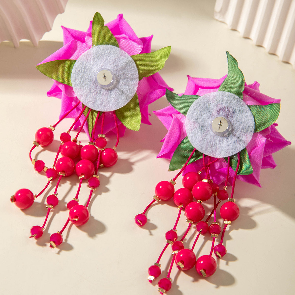 Boho Blooms: Oversized Faux Flower Tassel Earrings