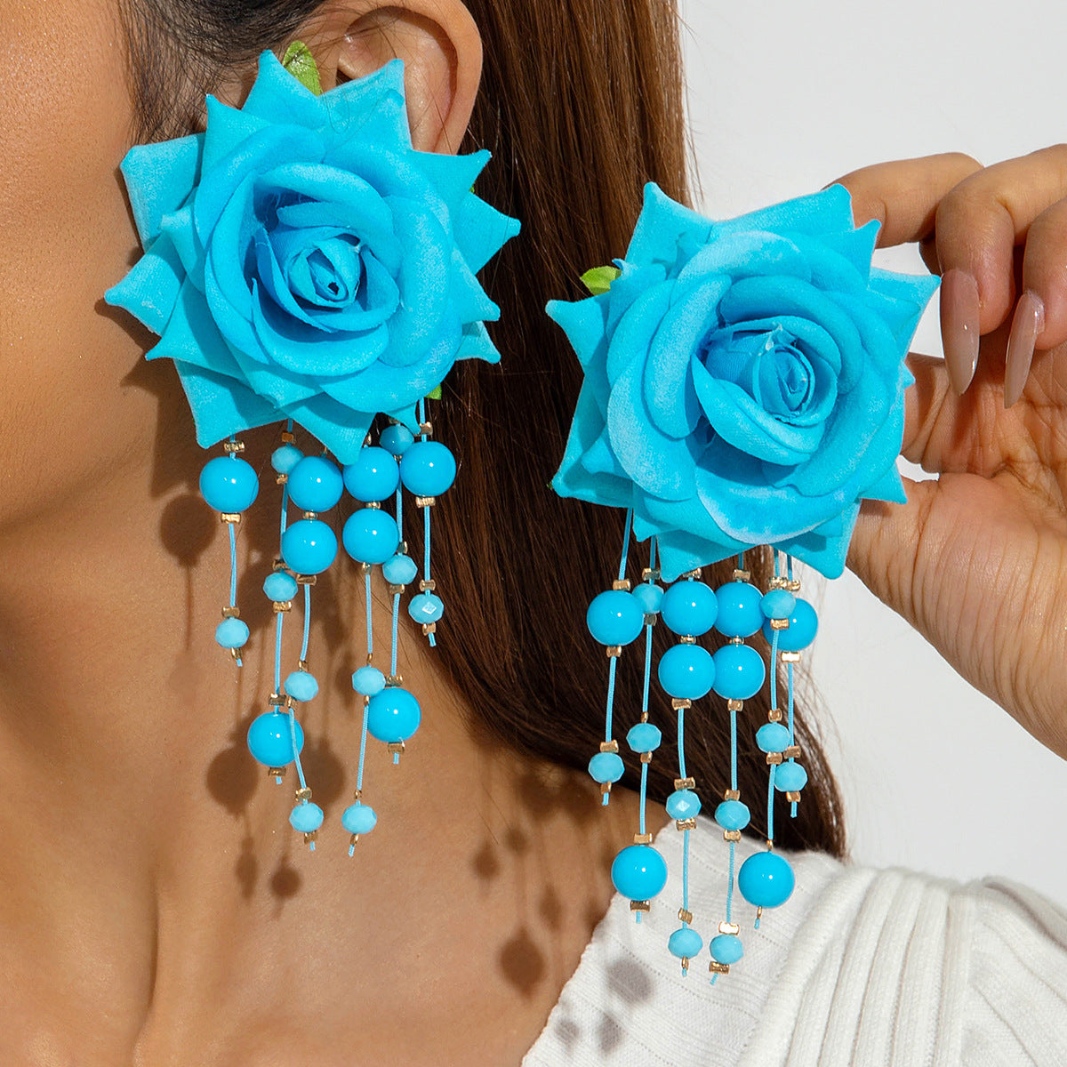 Boho Blooms: Oversized Faux Flower Tassel Earrings