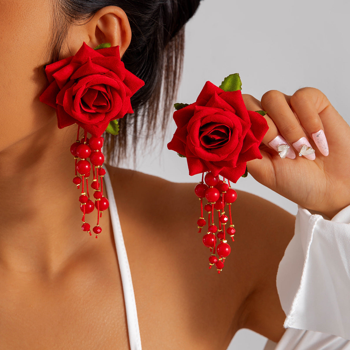 Boho Blooms: Oversized Faux Flower Tassel Earrings