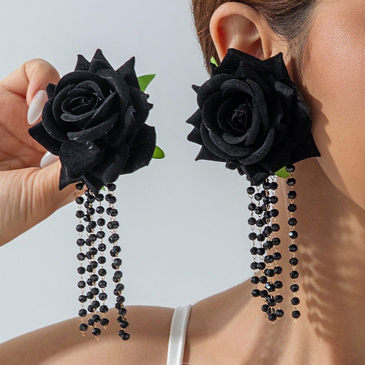 Boho Blooms: Oversized Faux Flower Tassel Earrings