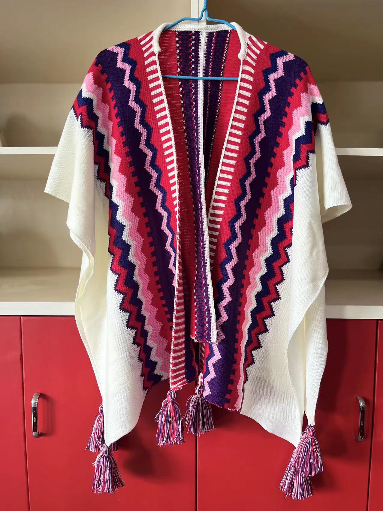 Bohemian Tassel Knit Cape – Free-Spirited & Stylish