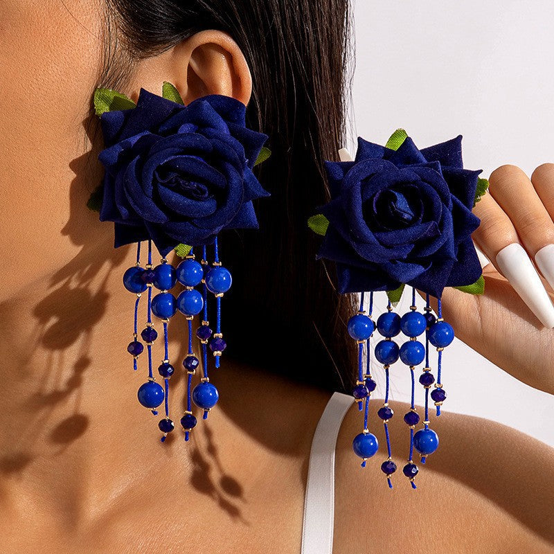 Boho Blooms: Oversized Faux Flower Tassel Earrings